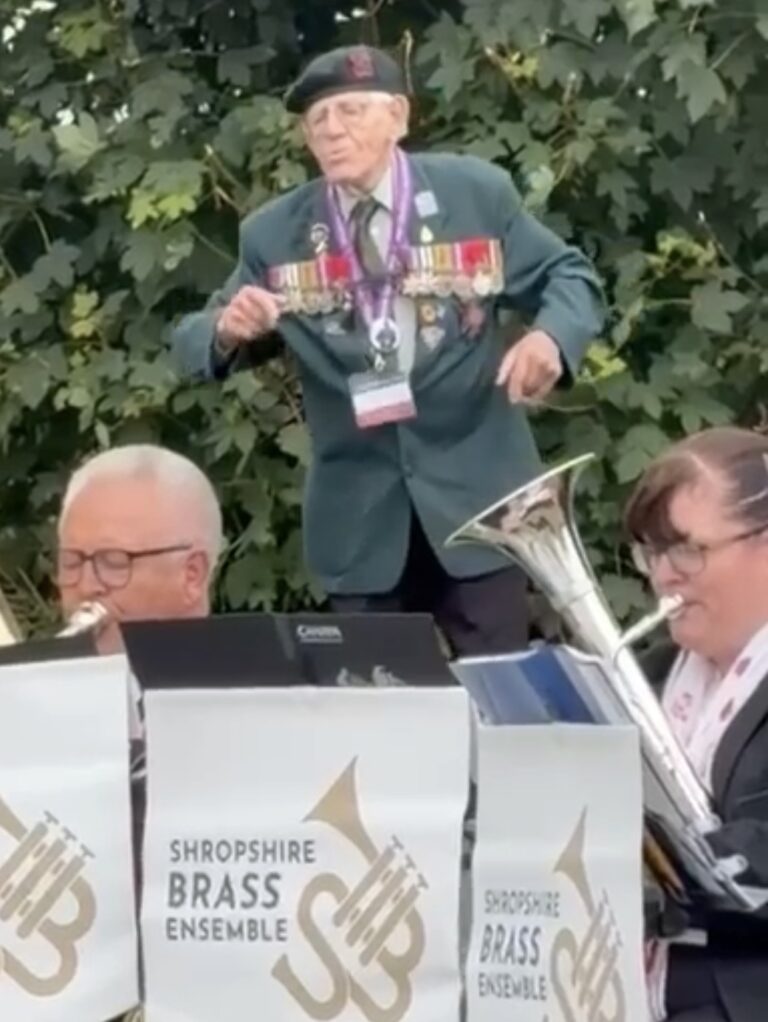 WWII Veteran Dances to the Sound of Shropshire Brass Ensemble at Pegasus Bridge